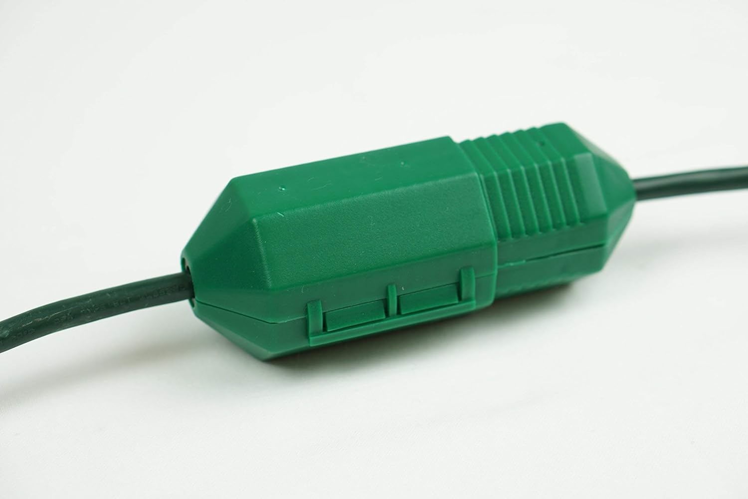 Green Extension Cord Safety Cover with Water-Resistant Seal for Cord Management